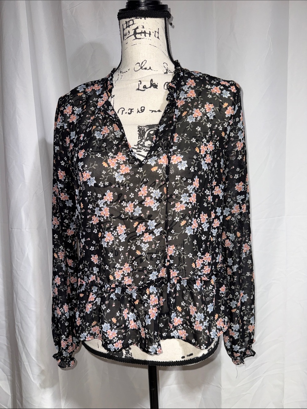 Divided Black Floral Ruffle V-Neck Blouse with Pink & Light Blue Flowers